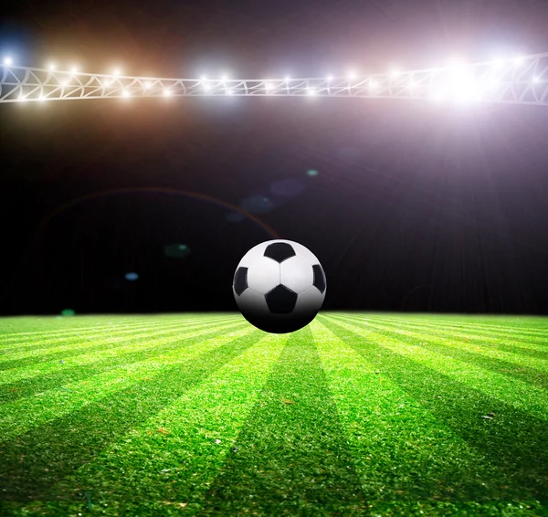 Soccer ball on stadium — Stock Photo, Image