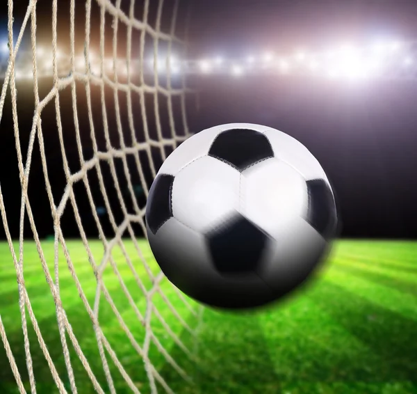 Soccer ball on stadium — Stock Photo, Image