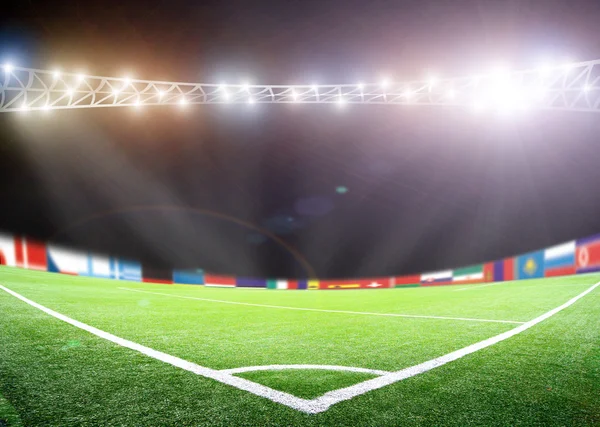 Światła w nocy i duża piłka nożna stadion — Zdjęcie stockowe