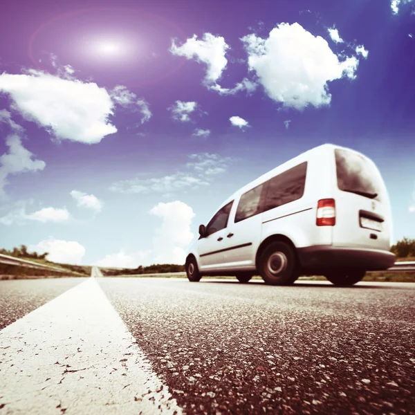 White car on asphalt road — Stock Photo, Image