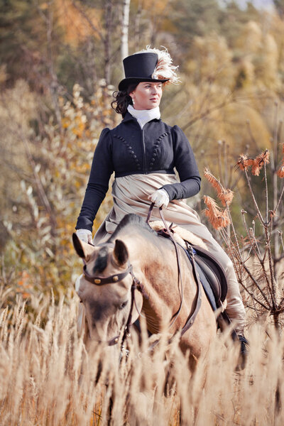 Horse-hunting with ladies in riding habit