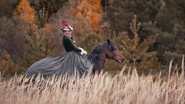 Pferdejagd mit Damen in Reiterkleidung — Stockfoto