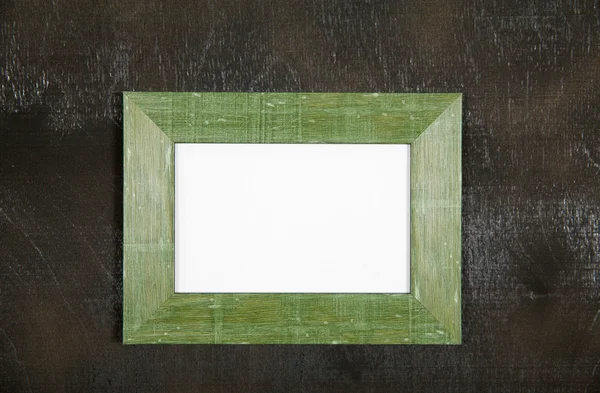 Zieloną ramką na czarnym tle — Zdjęcie stockowe