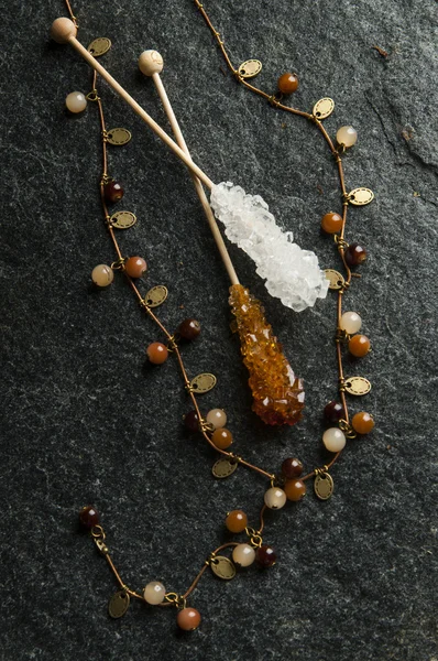 Women's necklace with sugar sticks — Stock Photo, Image