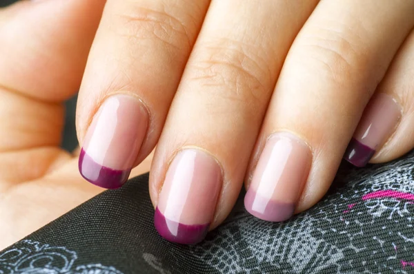 Purple acrylic manicure — Stock Photo, Image