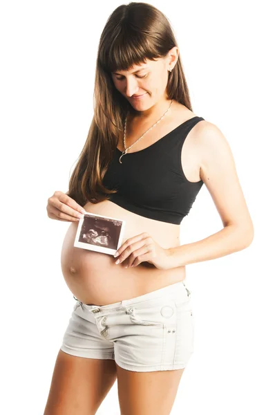 Pregnant woman with ultrasound scan — Stock Photo, Image