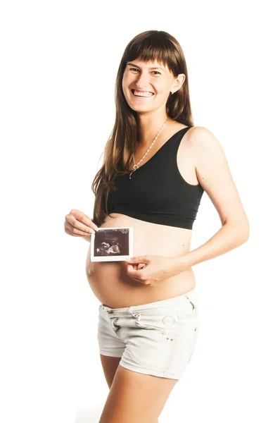 Pregnant woman with ultrasound scan — Stock Photo, Image