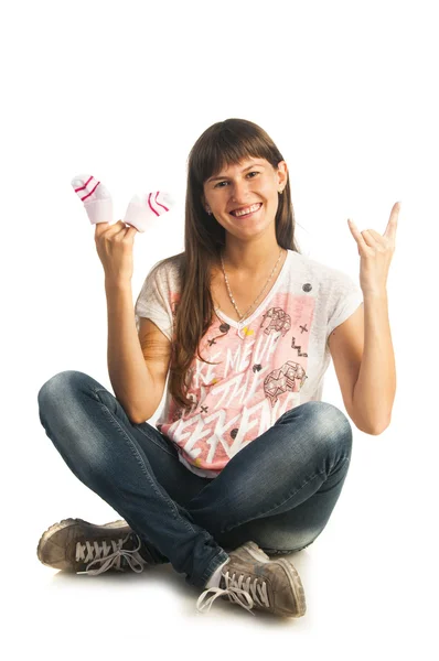 Pregnant woman holding small socks — Stock Photo, Image