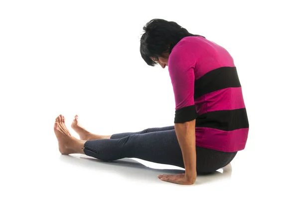 Mature woman in Dandasana yoga pose — Stock Photo, Image