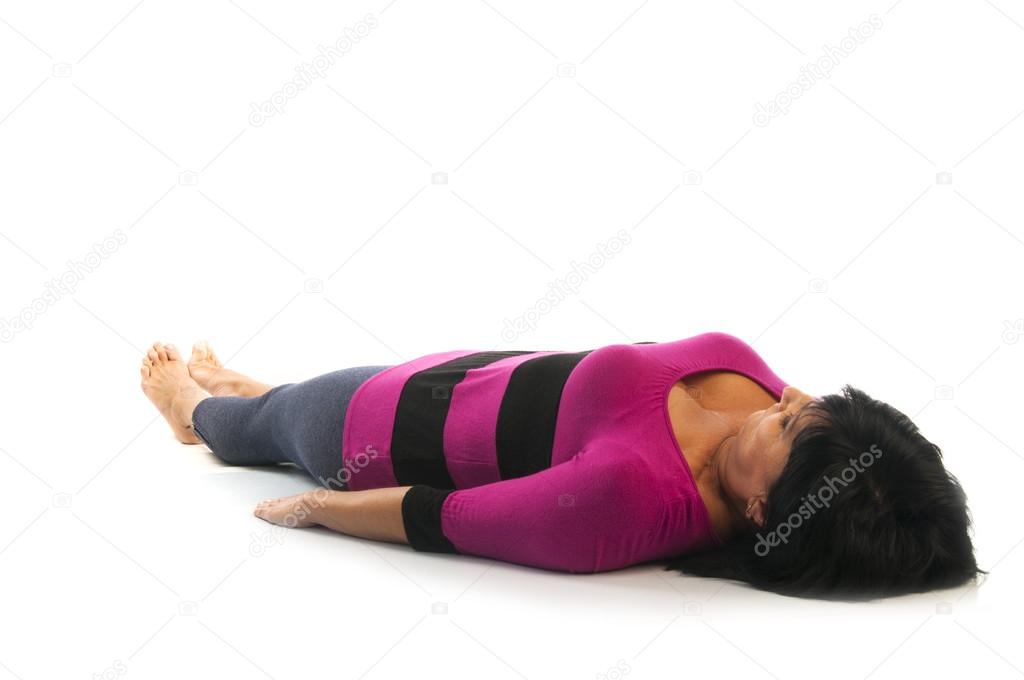 Woman in Shavasana  yoga pose