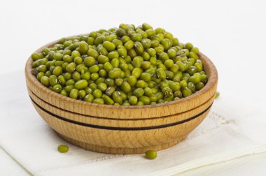 Mung beans in wooden bowl clipart