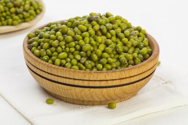 Mung beans in wooden bowl clipart