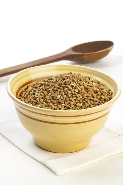 Buckwheat groats in bowl — Stok Foto