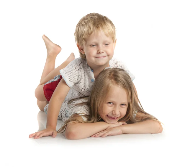 Little boy and girl lying — Stock Photo, Image