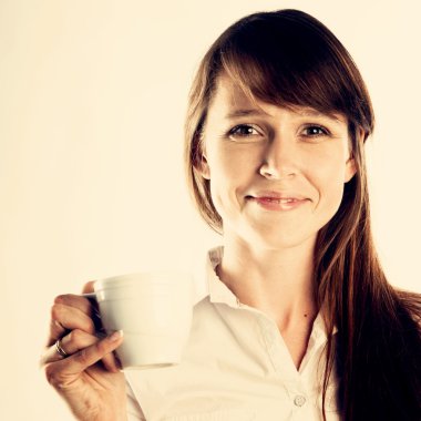 Bir fincan kahveli kadın.