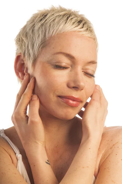 Woman touching her face — Stock Photo, Image