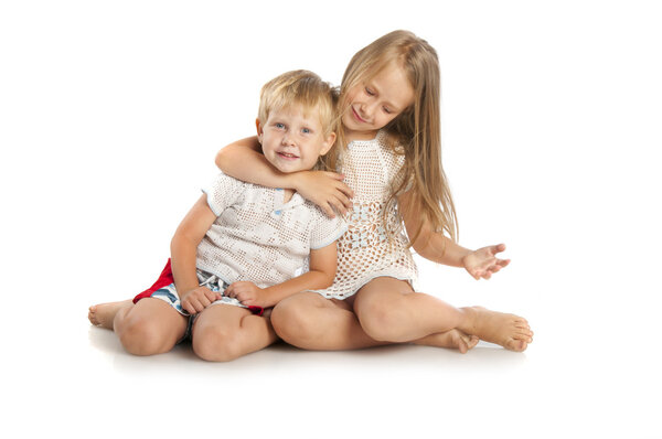 Little boy and girl sitting