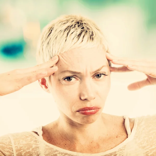 Woman suffering from head ache — Stock Photo, Image