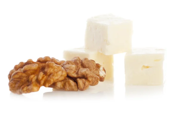 Подрібнення сиру і волоських горіхів — стокове фото