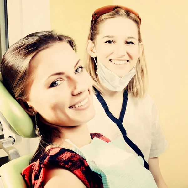 Dentist and patient in dental office — Stock Photo, Image