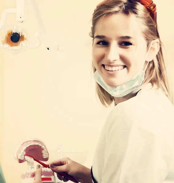 Female dentist smiling — Stock Photo, Image