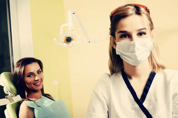 Dentist and patient in dental office — Stock Photo, Image