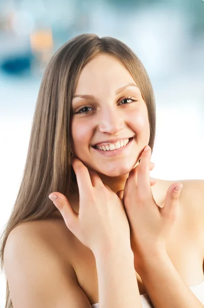 Girl touching her face — Stock Photo, Image