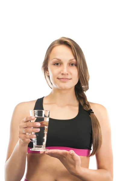 Menina bonita com um copo de água — Fotografia de Stock