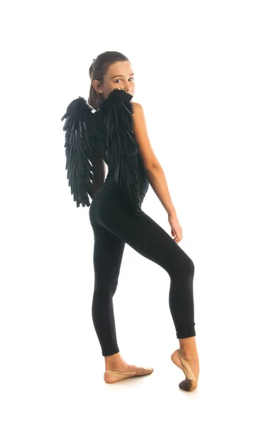 Girl posing with black wings — Stock Photo, Image