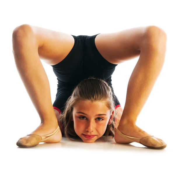 Girl doing gymnastic exercise — Stock Photo, Image