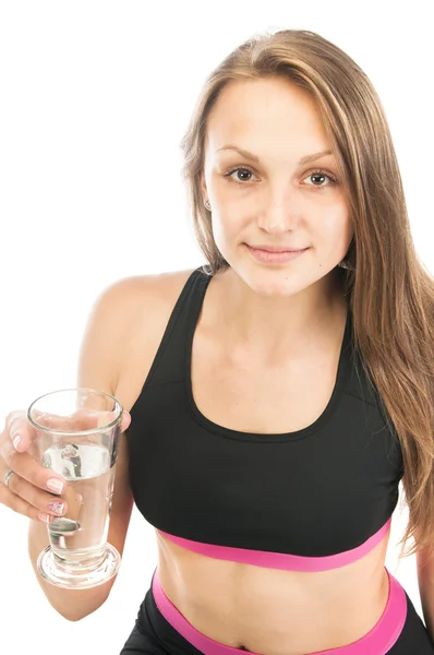 Menina bonita com um copo de água — Fotografia de Stock