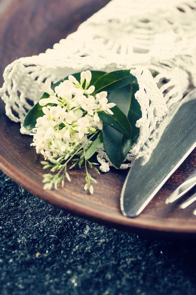 Place setting decorated with flowers — Stock Photo, Image