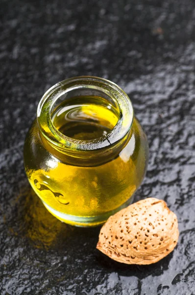 Almond oil in jar — Stock Photo, Image