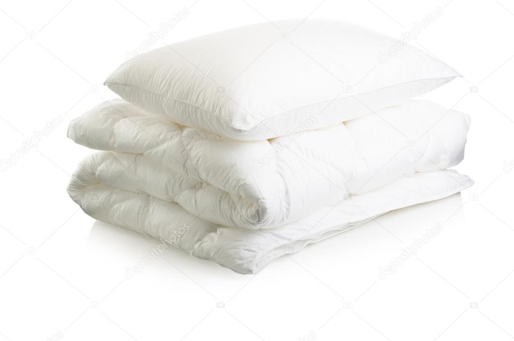 White blanket and pillow