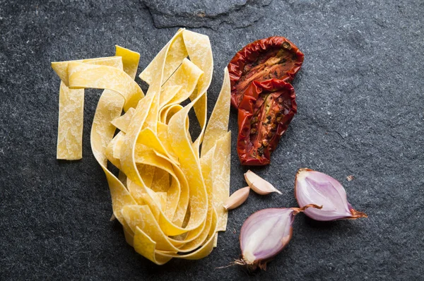 Italian pappardelle pasta with dry tomatoes — Stock Photo, Image