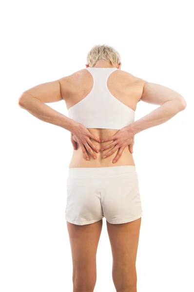 Frau mit Rückenschmerzen — Stockfoto
