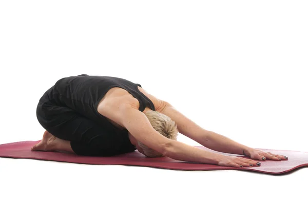 Mujer en pose de yoga Balasana —  Fotos de Stock