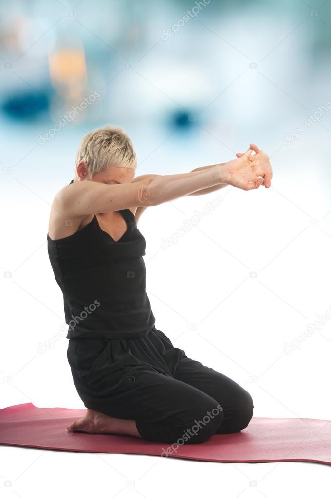 Woman in Vajrasana yoga Pose
