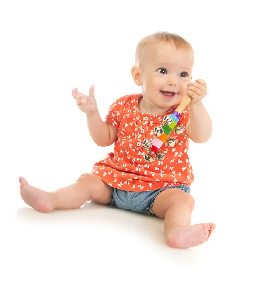 Söta skrattande flicka med leksak — Stockfoto