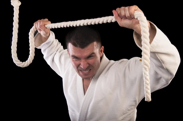 Hombre practicando jiu-jitsu brasileño — Foto de Stock