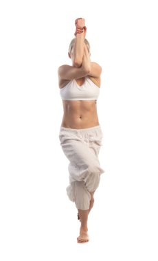 Kadın yoga Garudasana poz
