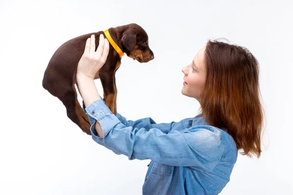 Red girl with puppy — Stock Photo, Image