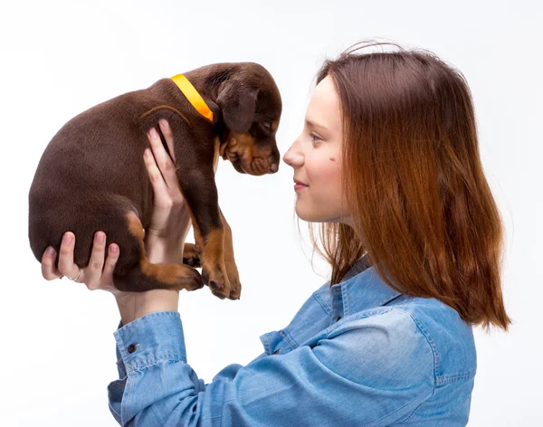 Red girl with puppy — Stock Photo, Image