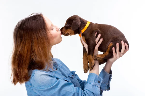 Red girl with puppy — Stock Photo, Image