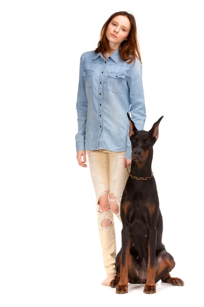 Red girl in jeans with big dog — Stock Photo, Image