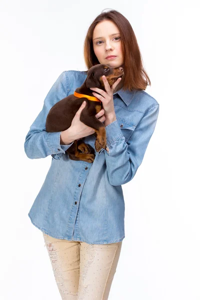 Red girl with puppy — Stock Photo, Image