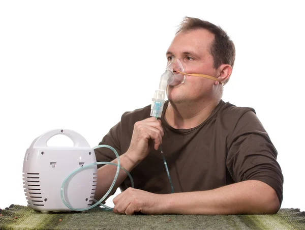 Volwassen man met inhalter — Stockfoto