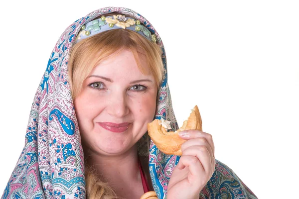 Pretty Plus size Woman in russian national scarf with a pile of — Stock Photo, Image