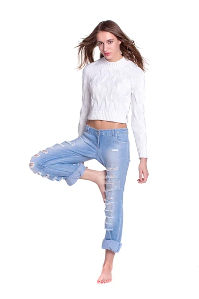 Pretty woman in blue jeans — Stock Photo, Image