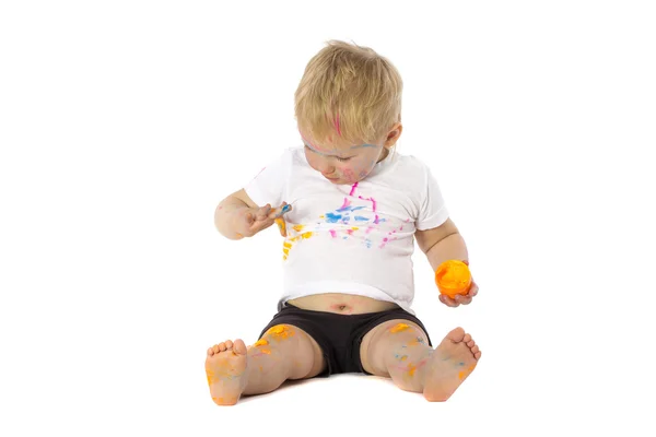 Blond kid paint plays — Stock Photo, Image